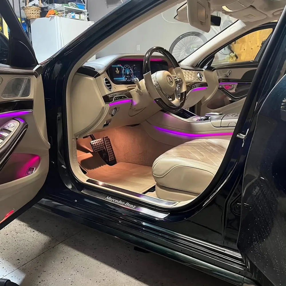 Detailed luxury sedan interior with ambient lighting
